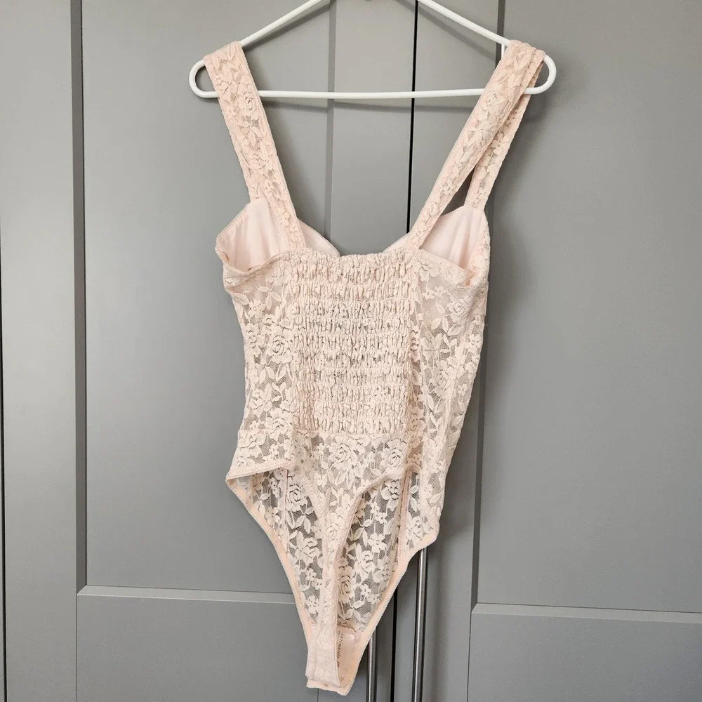 New $79 Free People Intimately Women's Strike A Pose Bodysuit Peach Medium M